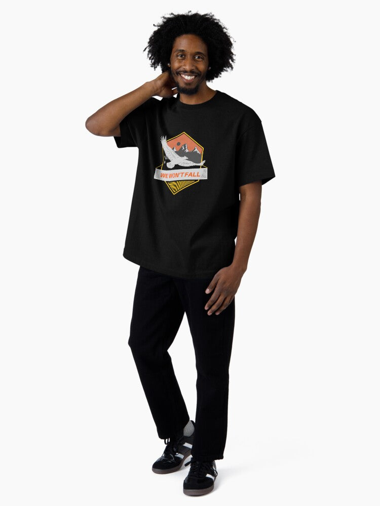 Strength and Resilience with a Majestic Eagle: We Won't Fall Design Oversized T-Shirt